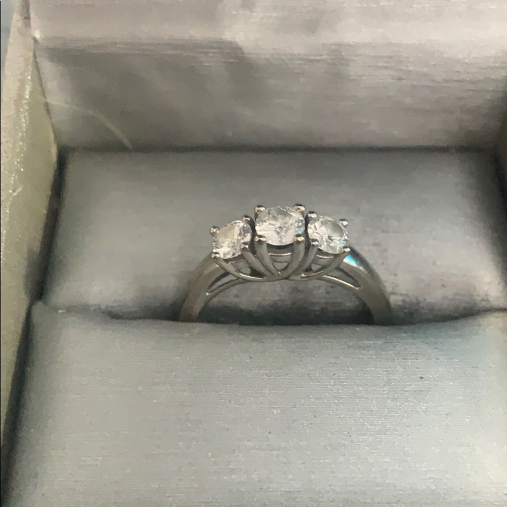 White gold. Past, present and future ring.